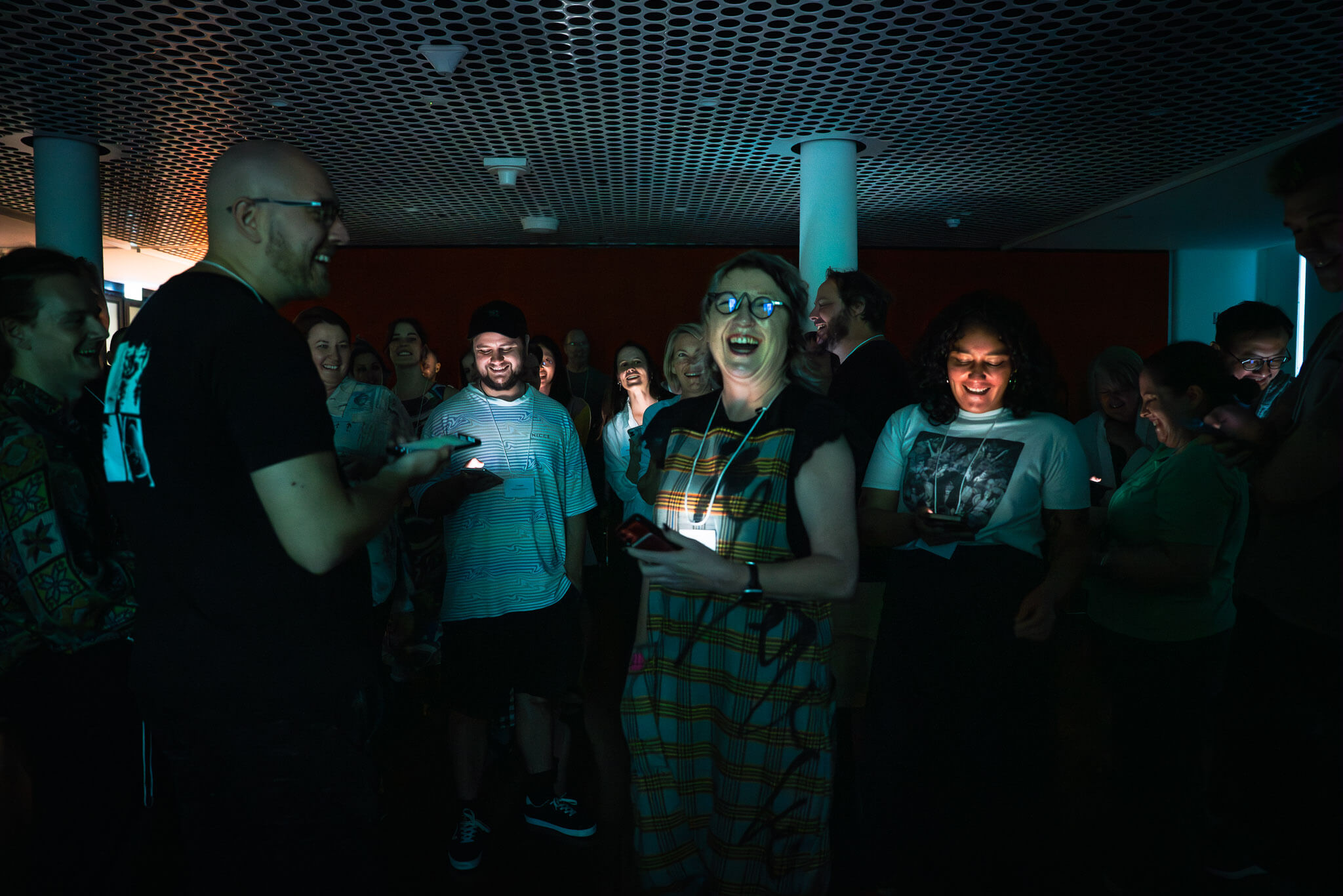 Image of a group of audience members smiling