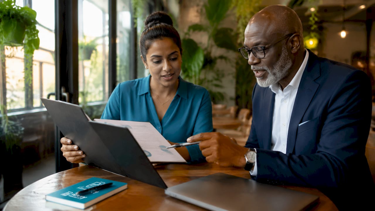 Buyers reviewing surveyor accreditation documents