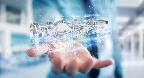 Businessman on blurred background using wireframe holographic 3D digital projection of an engine