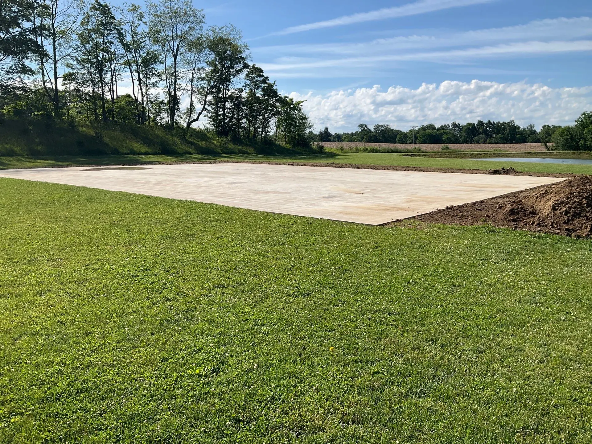 New concrete slab before installation of an outdoor pickleball court coating system