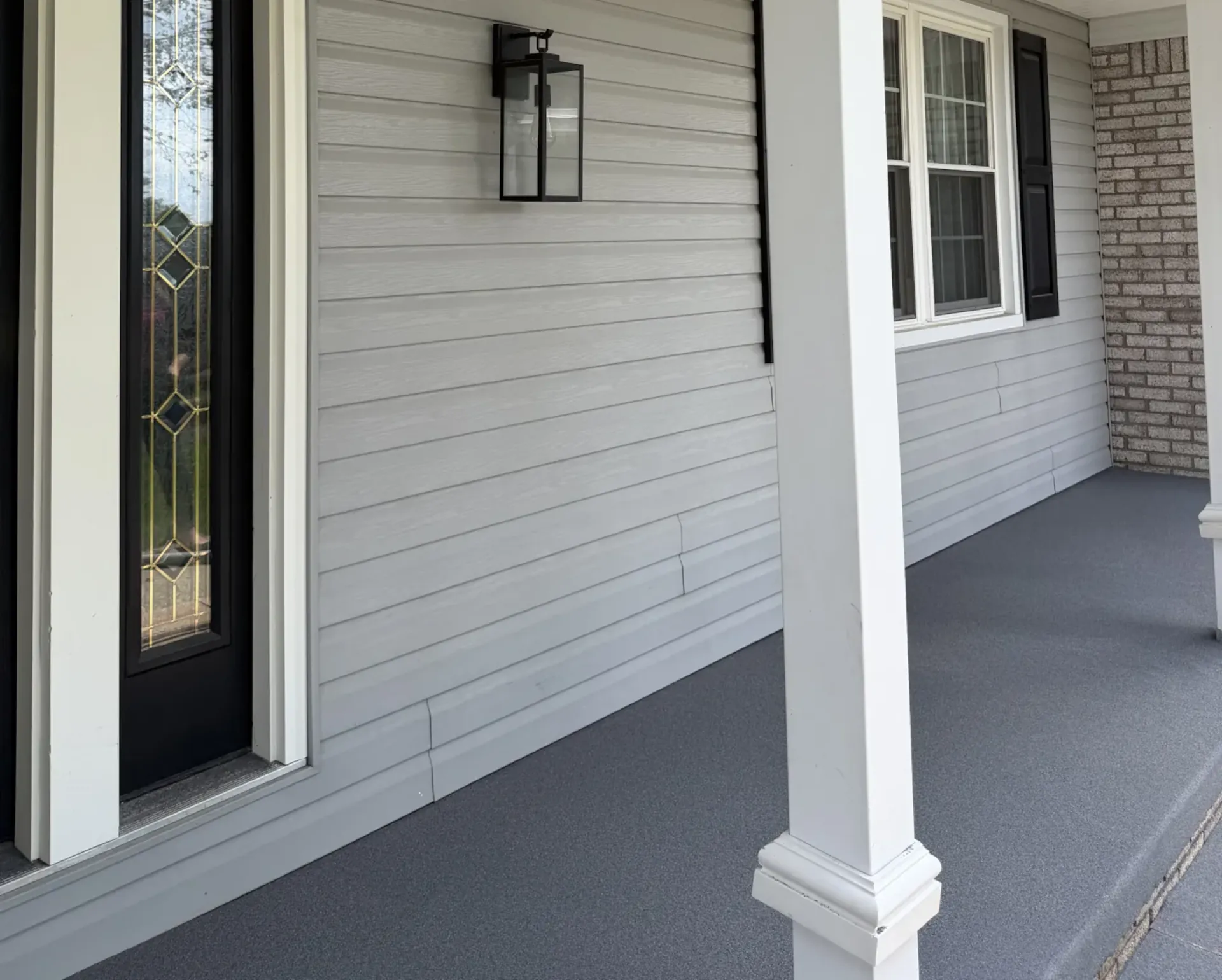 Twilight quartz porch floor coating on a Sugarcreek, Ohio home