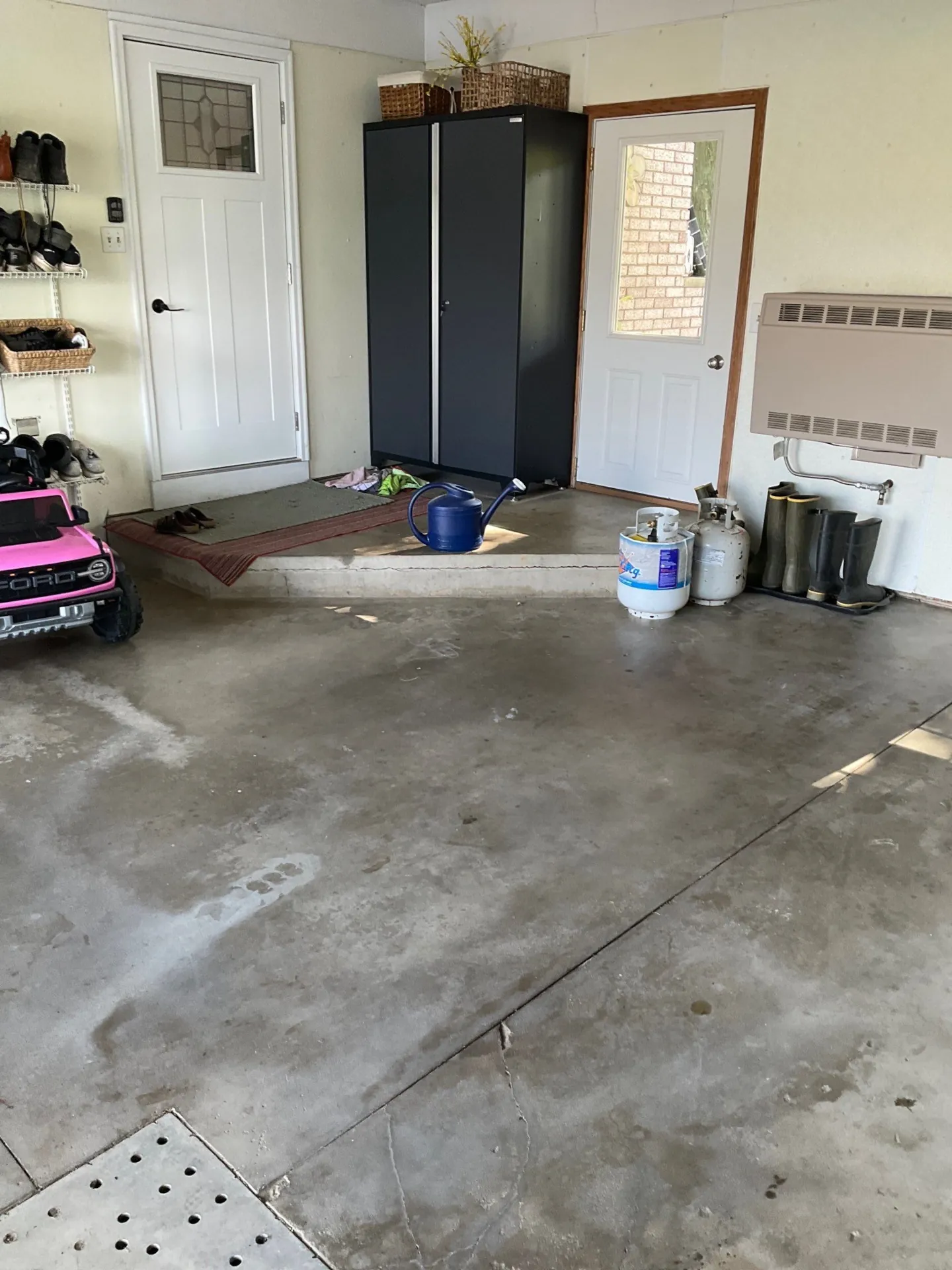 Concrete garage floor before decorative flake coating installation in Sugarcreek, Ohio