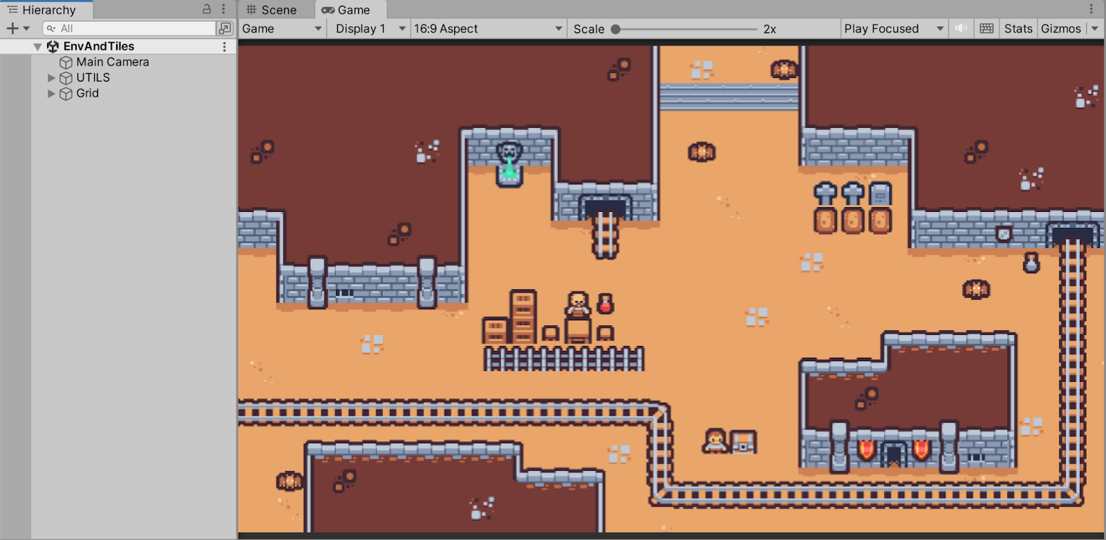 “EnvAndTiles” scene, that contains the tilemap and environment assets