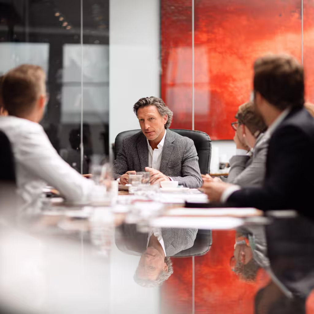 Public Mergers and Acquisitions strategy discussion with business leaders, symbolizing reverse takeovers, SPACs.