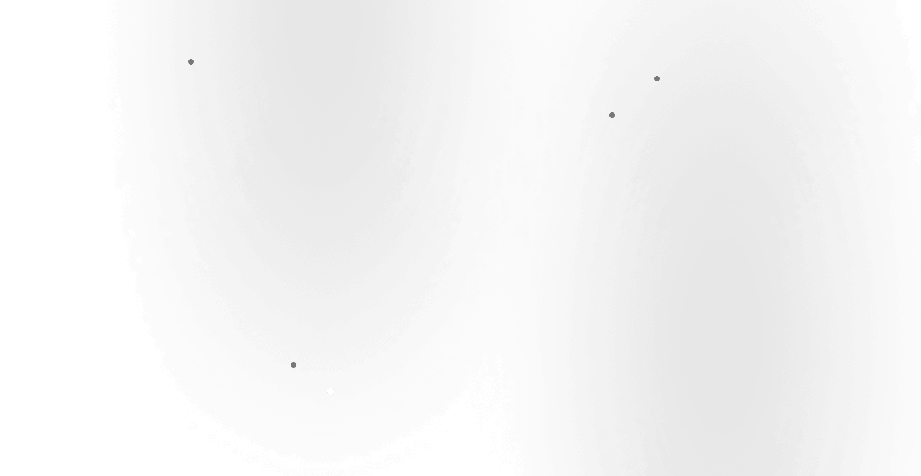 Clean indoor space with modern table, large surfboard artwork, and loft-style window in background.