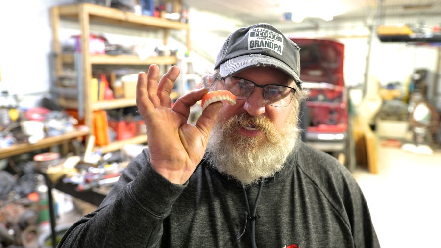 Dan Holding Dentures