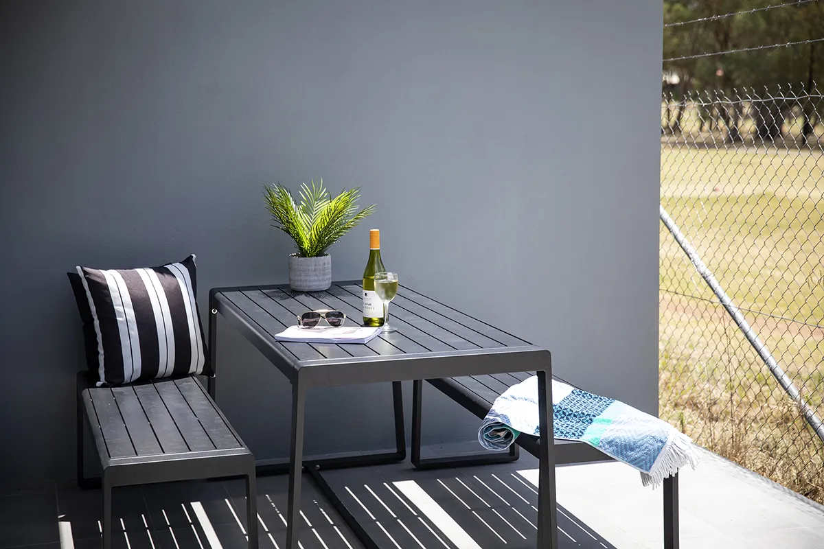Balcony table set for guests at CH Boutique Apartments, Tamworth