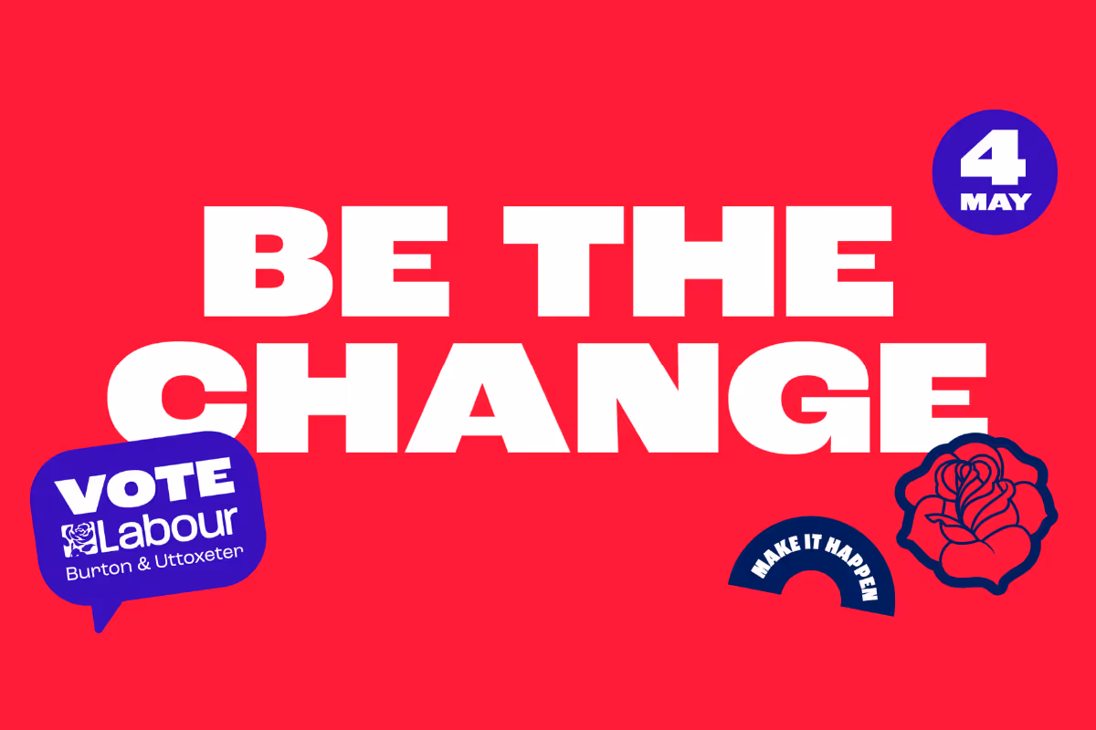White text containing campaign slogan "Be The Change" on a red background. 
