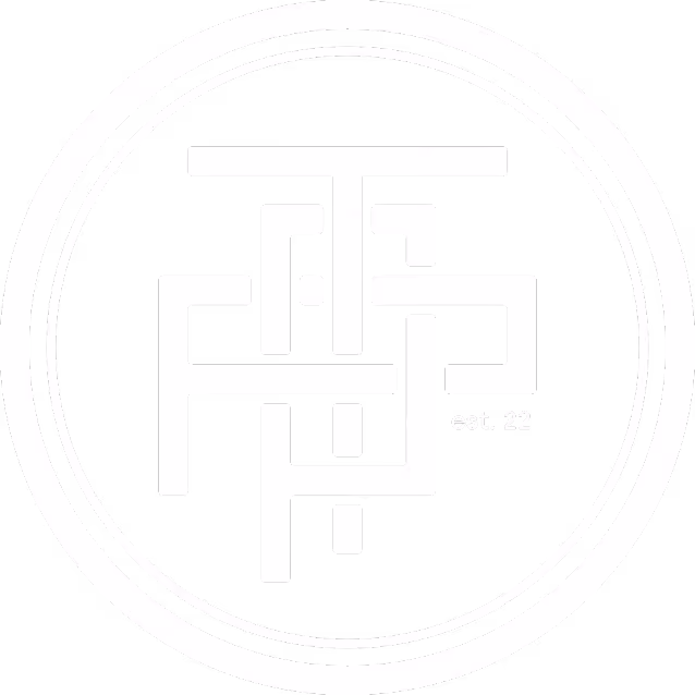 Abstract white maze-like geometric symbol inside two concentric circles with text 'est. 22' on black background.