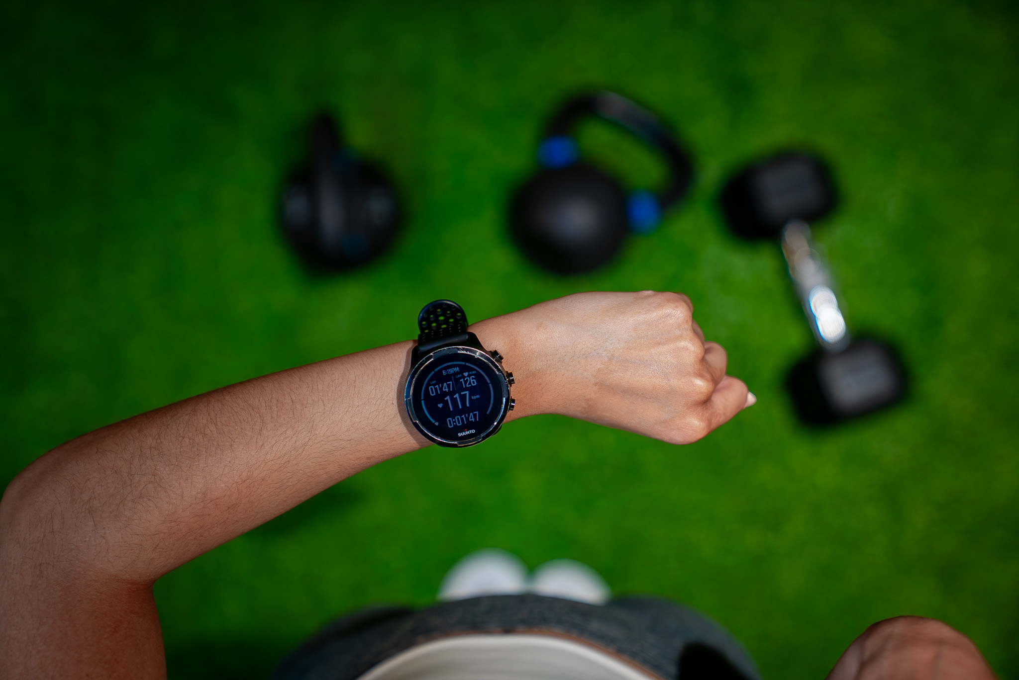 Members using TRX training equipment during a class at FIELDHOUSE gym