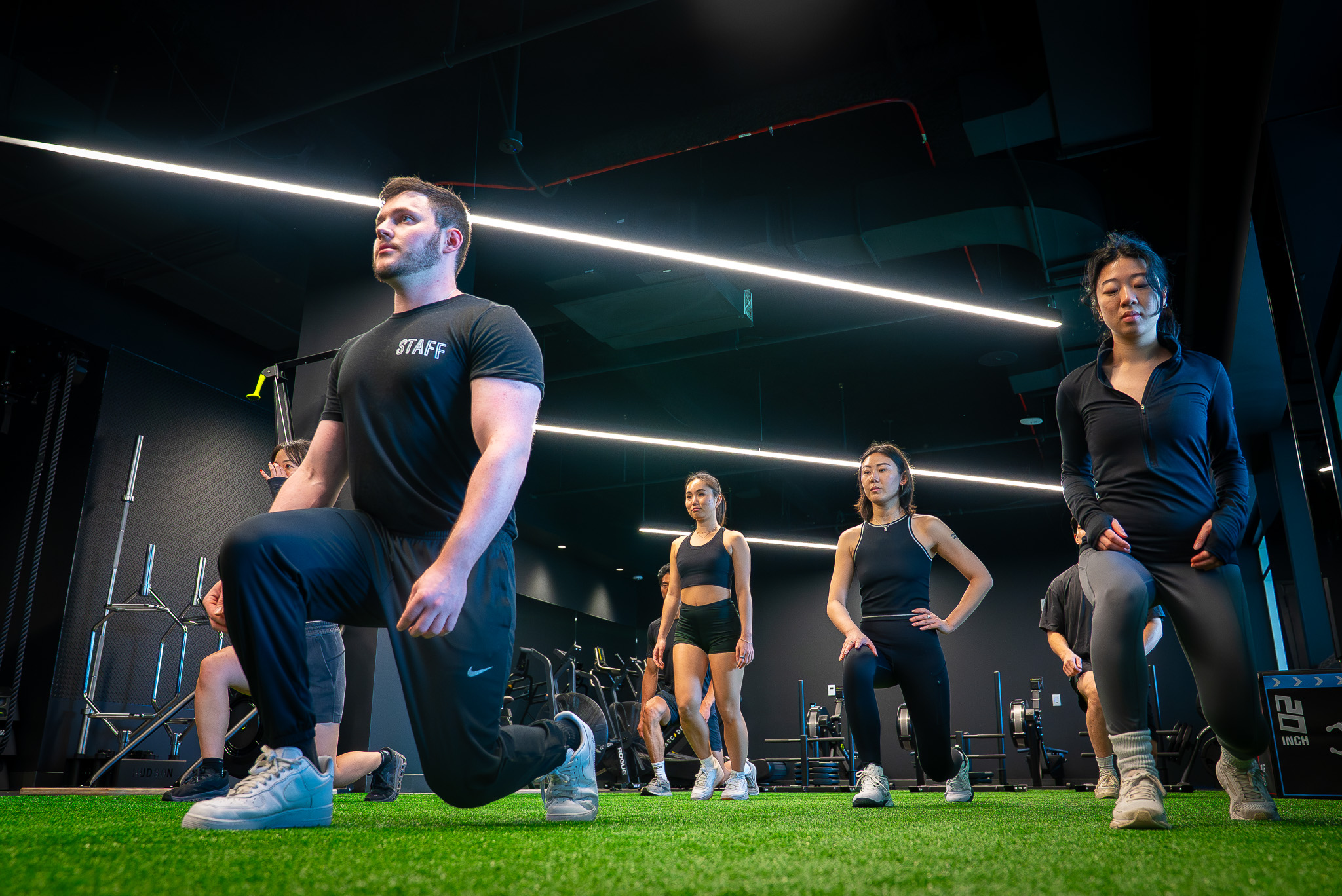 Members participating in a group workout class at FIELDHOUSE gym
