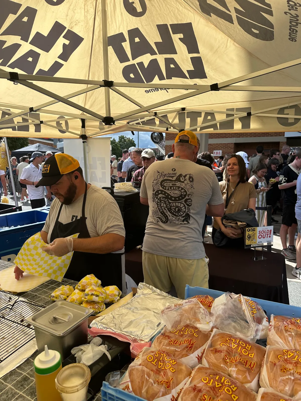 Flatland crew slinging burgers to a game day line