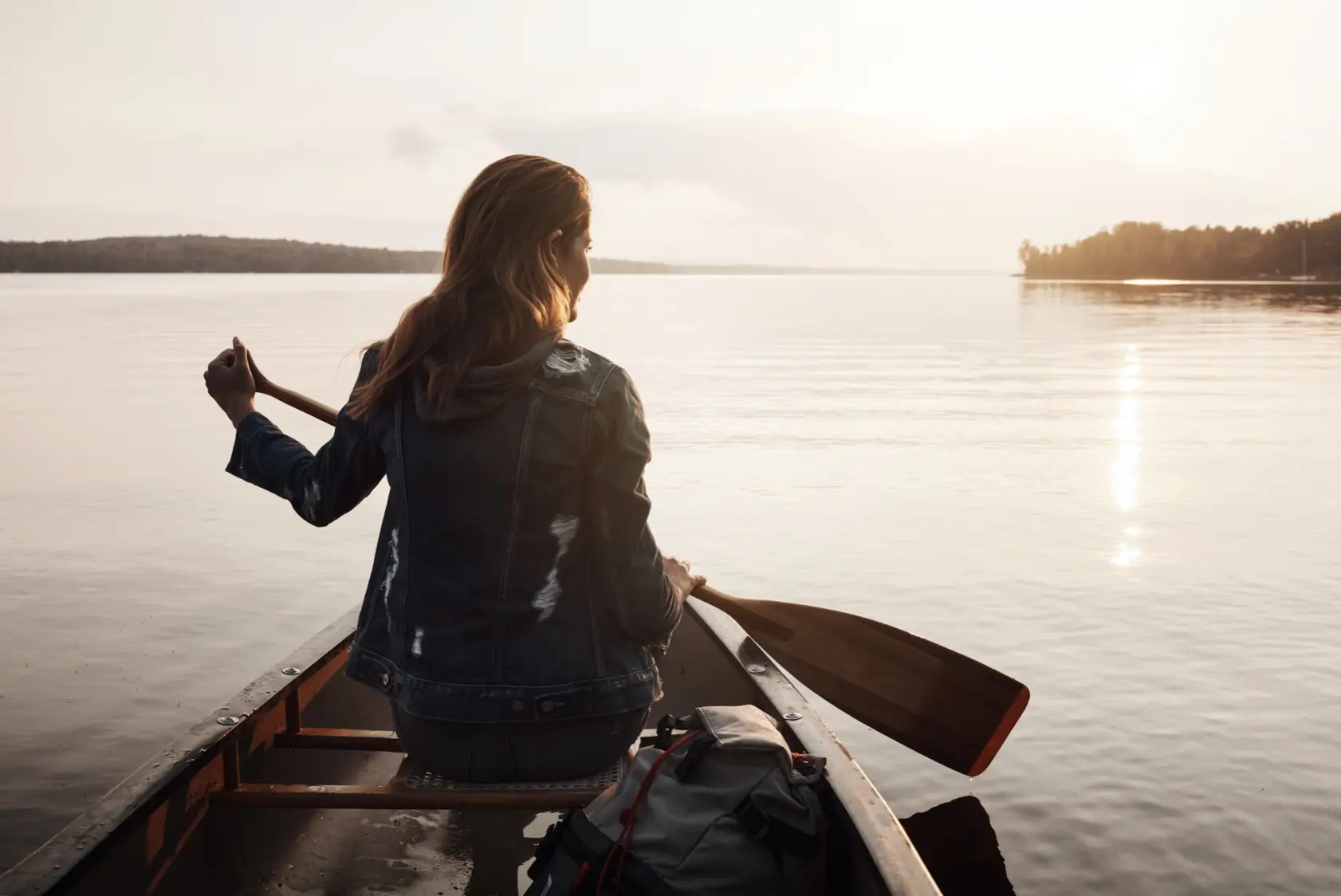 Woman in a canoe on a lake