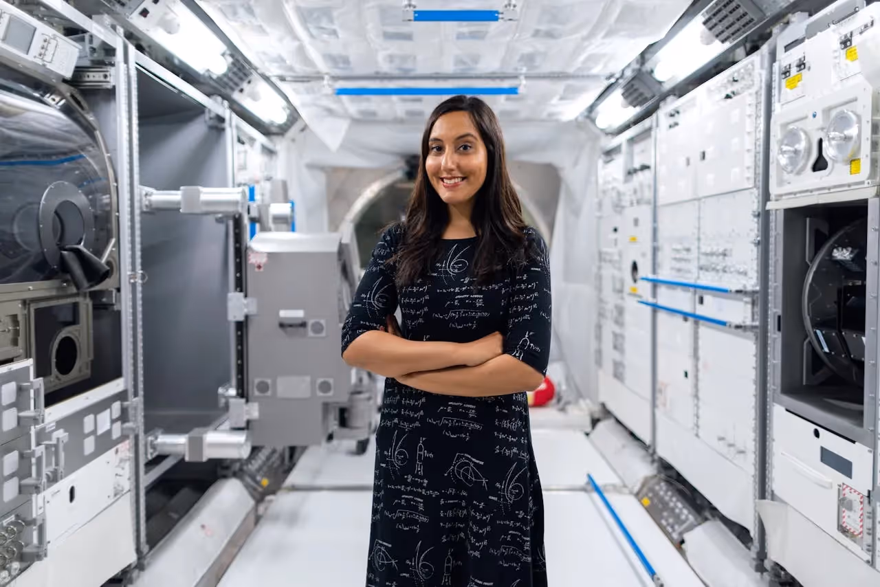 Atmospheric Space Scientist in lab studying data.