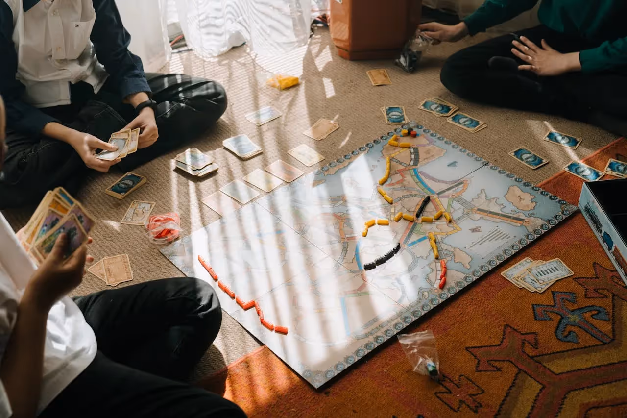 Group of students playing popular Euro board games.