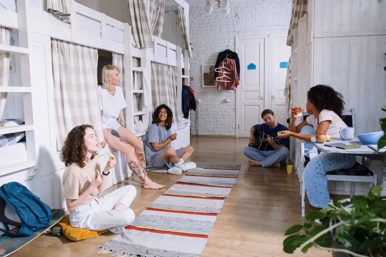 Cozy 4-person dorm room layout - shared spaces.