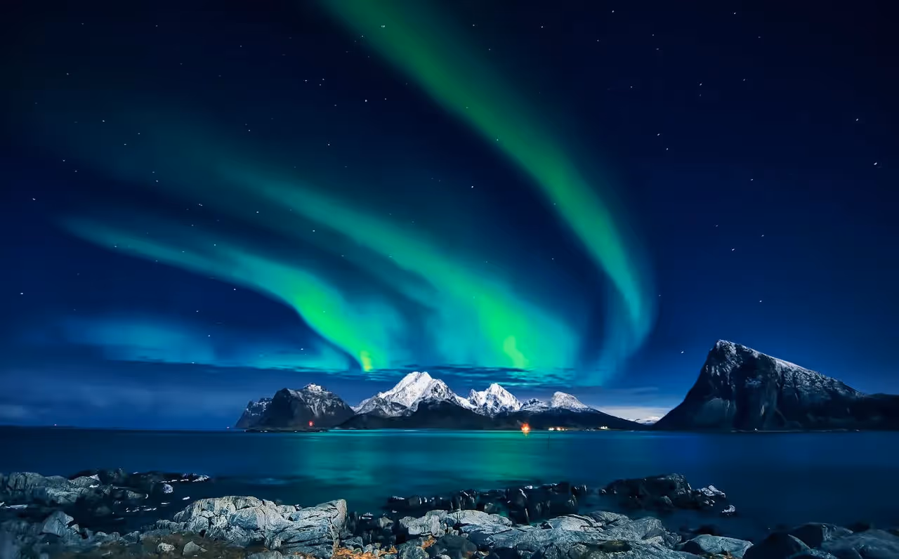 Northern Lights Alaska night sky green aurora borealis wilderness.