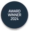 Circular badge with text 'AWARD WINNER 2024' in white on dark blue background.