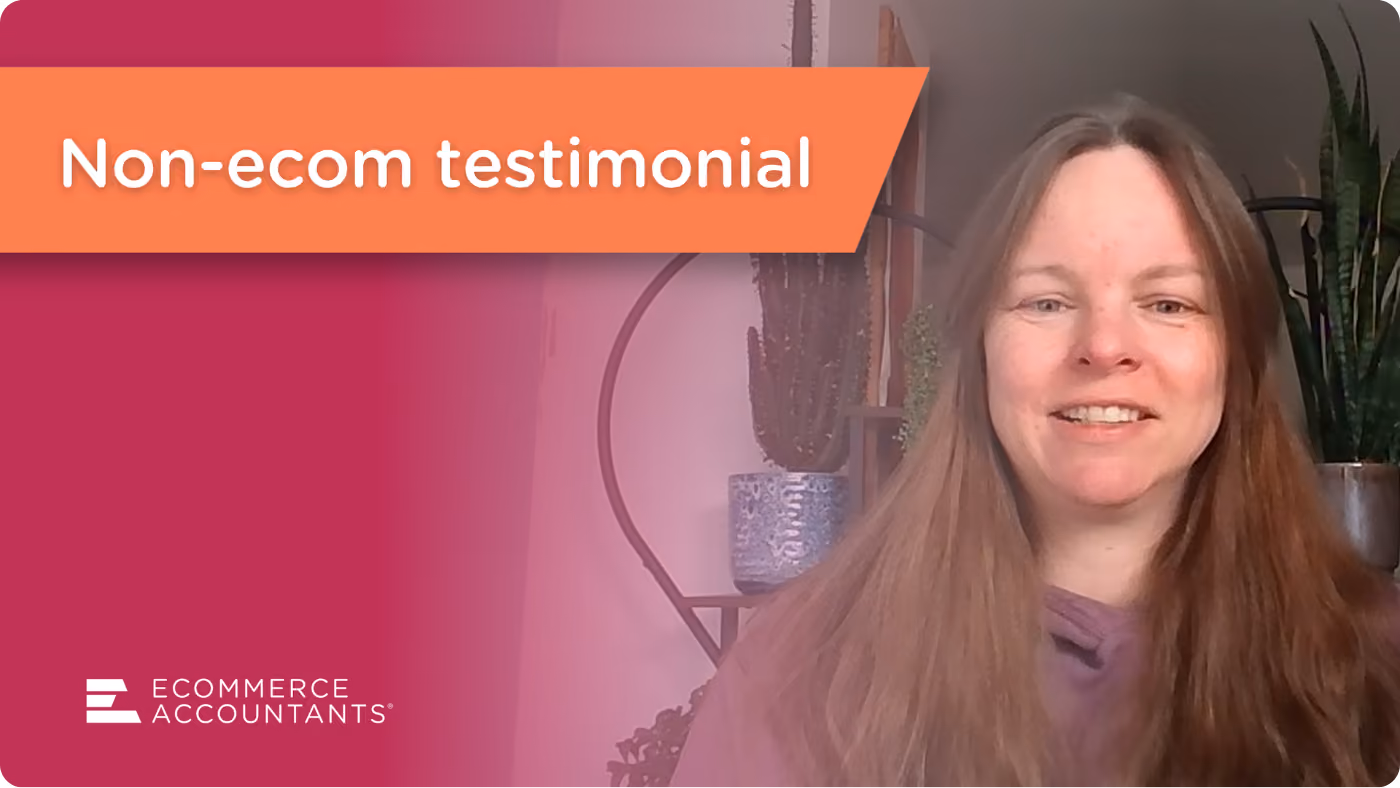 Smiling woman with long hair giving a non-ecommerce testimonial with plants in the background.