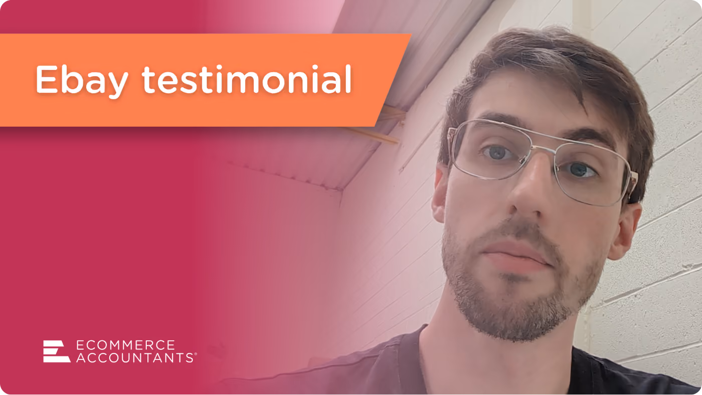 Young man with glasses and beard in a light-colored room with Ecommerce Accountants branding.