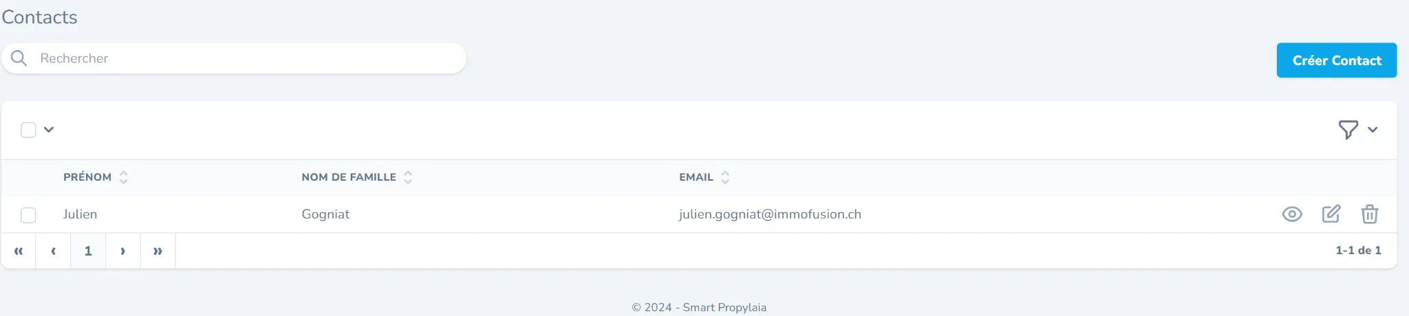Tableau de contacts montrant un contact avec prénom Julien, nom de famille Gogniat et email julien.gogniat@immofusion.ch, avec options pour voir, modifier ou supprimer.