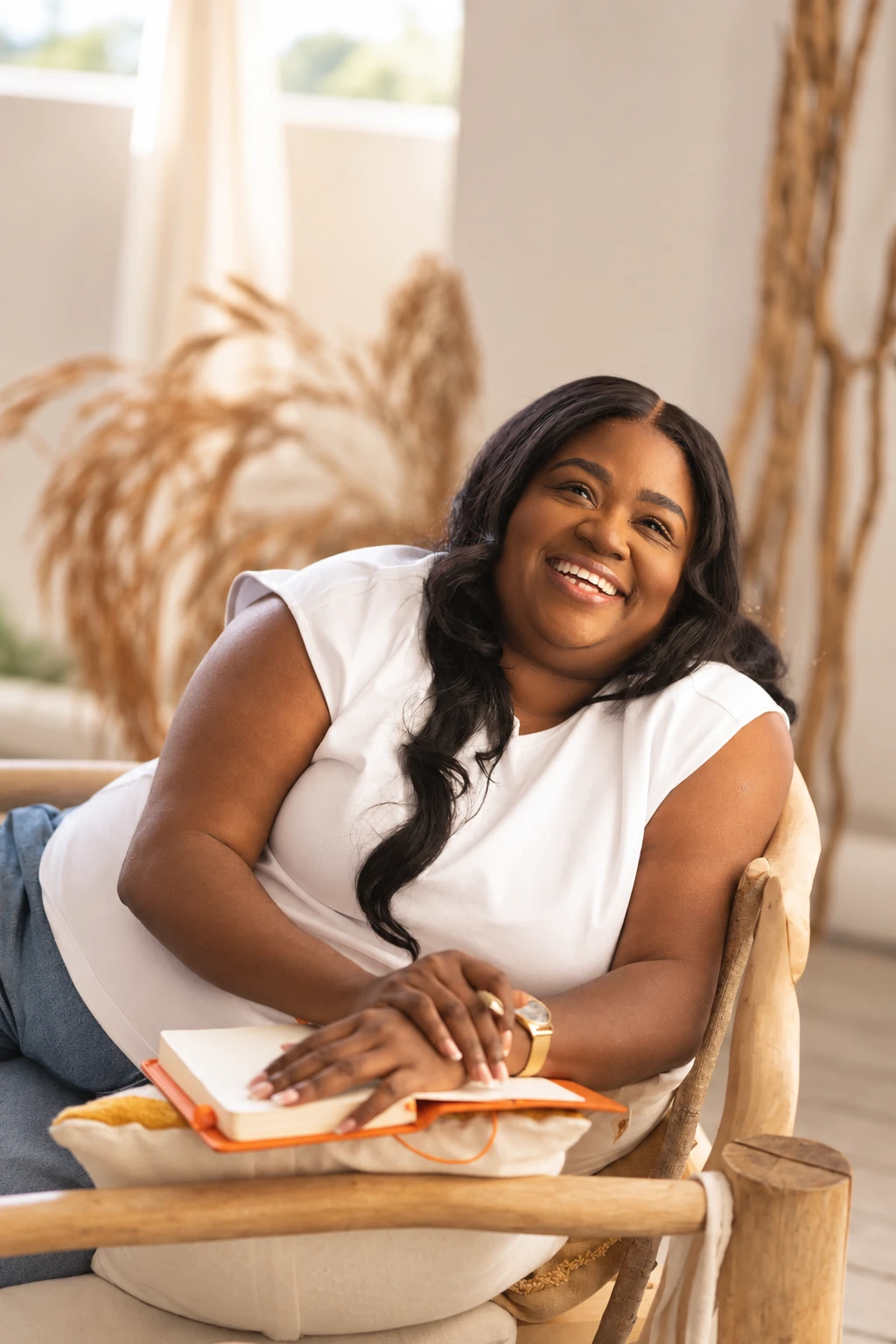 Michelle smiling with an open notebook