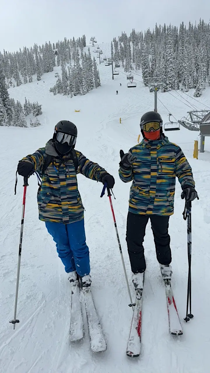 Jacob and a friend posing on a ski slope in Winter Park, CO