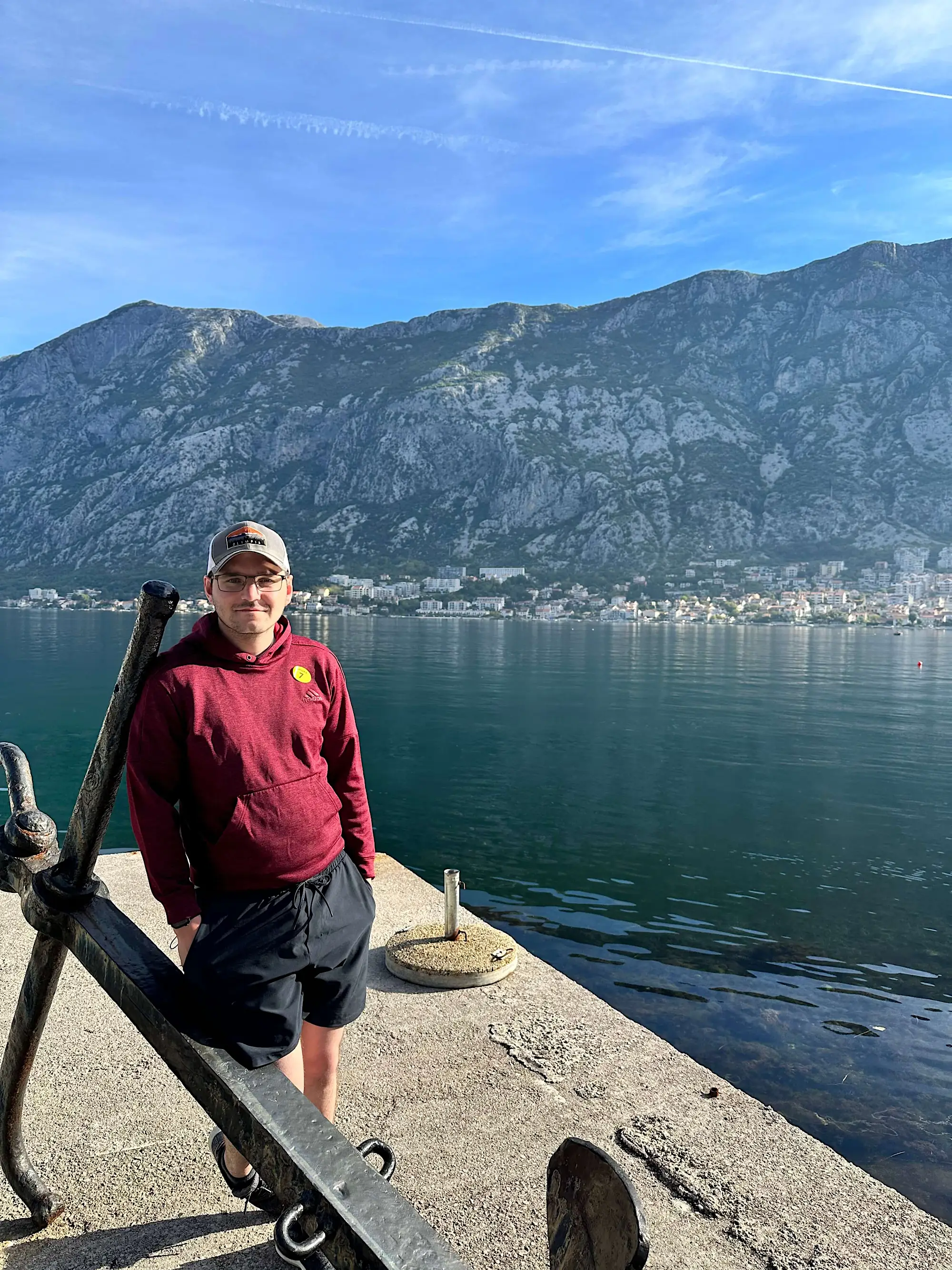 Jacob Trujillo standing on a dock in Montenegro