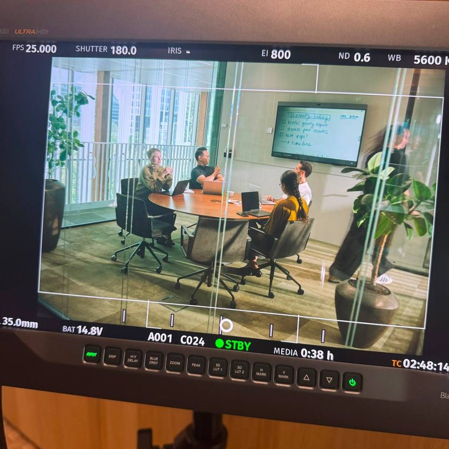 Next Sense team reviewing plans in the office