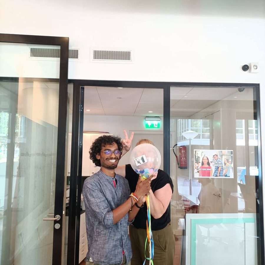 Next Sense colleagues celebrating in the office