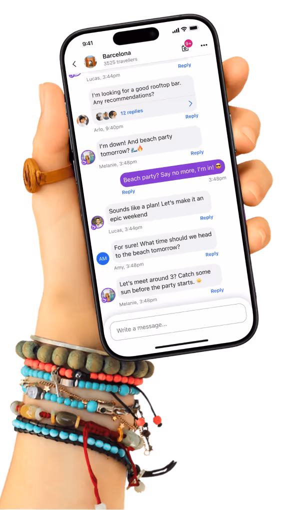 a hand holding an iphone with the hostelworld chat in the screen