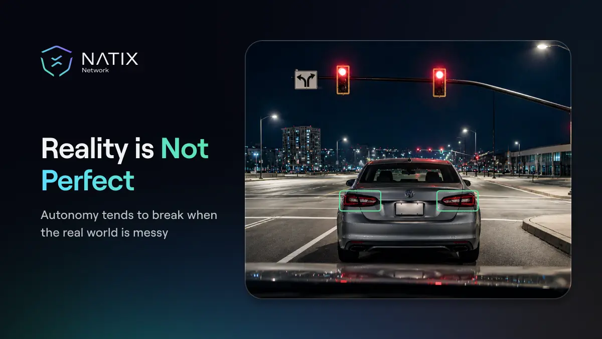 A vehicle stopped at a red light without its tail lights on despite being stopped