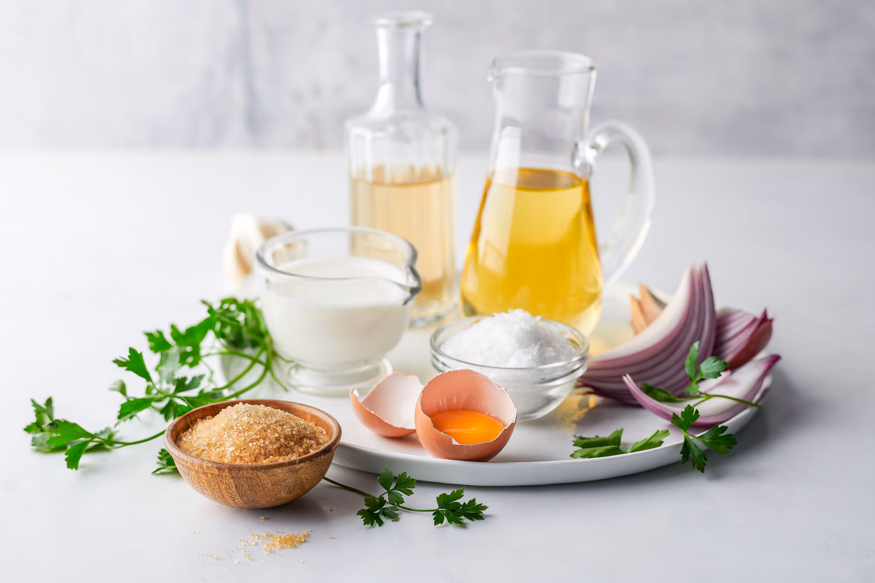An image of a bread board, arranged with all of the ingredients used in one of T. Marzetti's sauces. Photo by Christi Chambers.