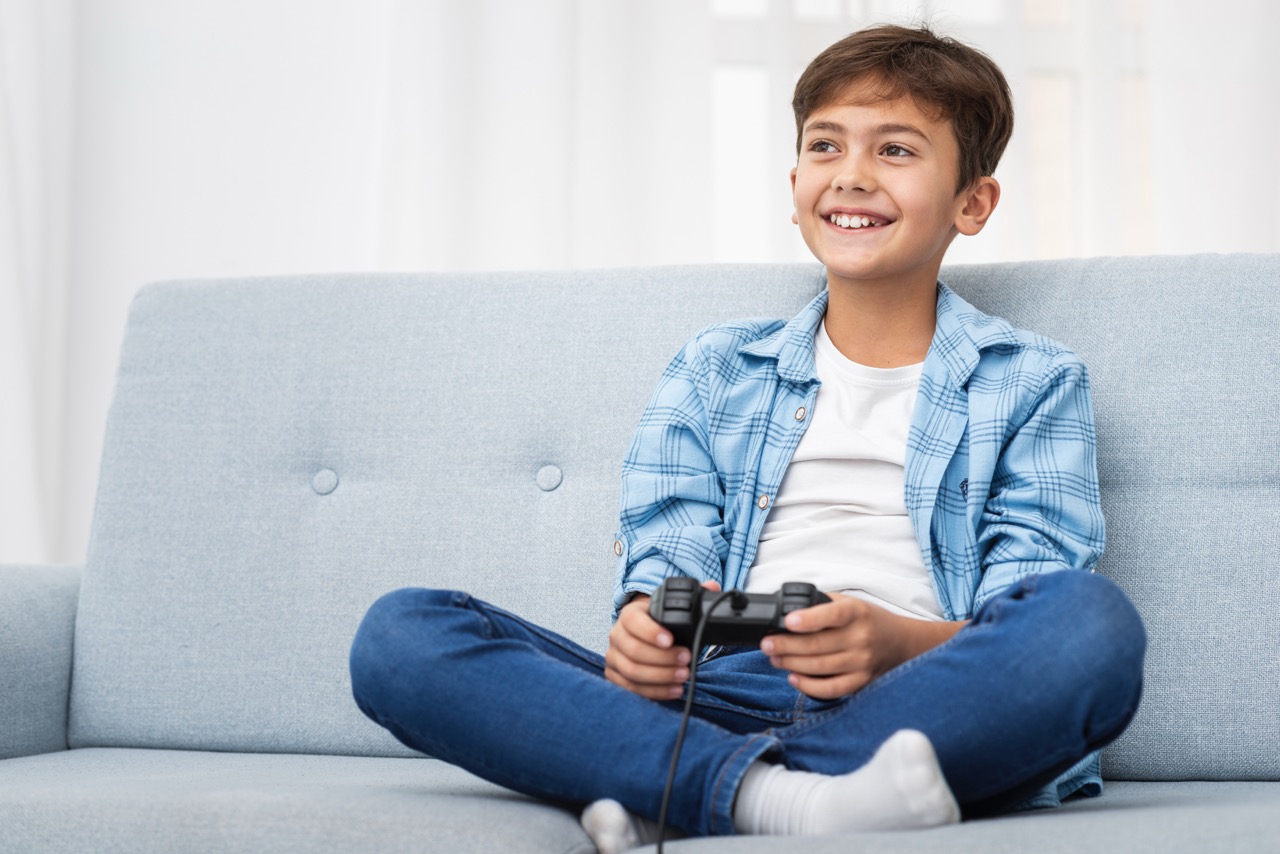 Gaming is now a central part of many children’s lives, offering benefits like creativity, problem-solving, and teamwork, but it can tip into addiction when it disrupts sleep, school, or social interaction. Warning signs of dependency include lying about gaming time, irritability when asked to stop, loss of interest in other activities, rushing through responsibilities, and staying up late to play. Instead of banning games outright, parents can use tools like ParentVerse to set game-specific limits, schedule playtime around schoolwork, and monitor usage across multiple devices. Gamified reward systems can further encourage good habits by letting kids earn extra gaming time or other perks for completing chores, finishing homework, and following screen rules. Establishing a balanced routine—such as homework before 30–60 minutes of gaming, no play in the mornings, and longer but managed weekend sessions—helps children enjoy gaming without it dominating their lives. By combining boundaries, rewards, and shared decision-making, parents can keep gaming fun, safe, and under control.