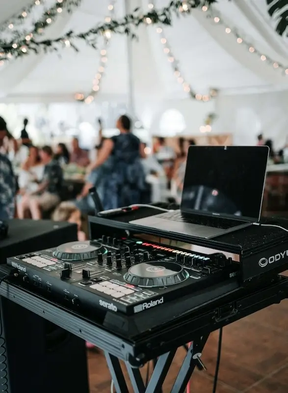 A DJ table at a wedding event