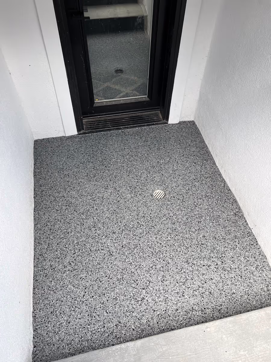 Front door porch with a fresh polyaspartic 1 Day system