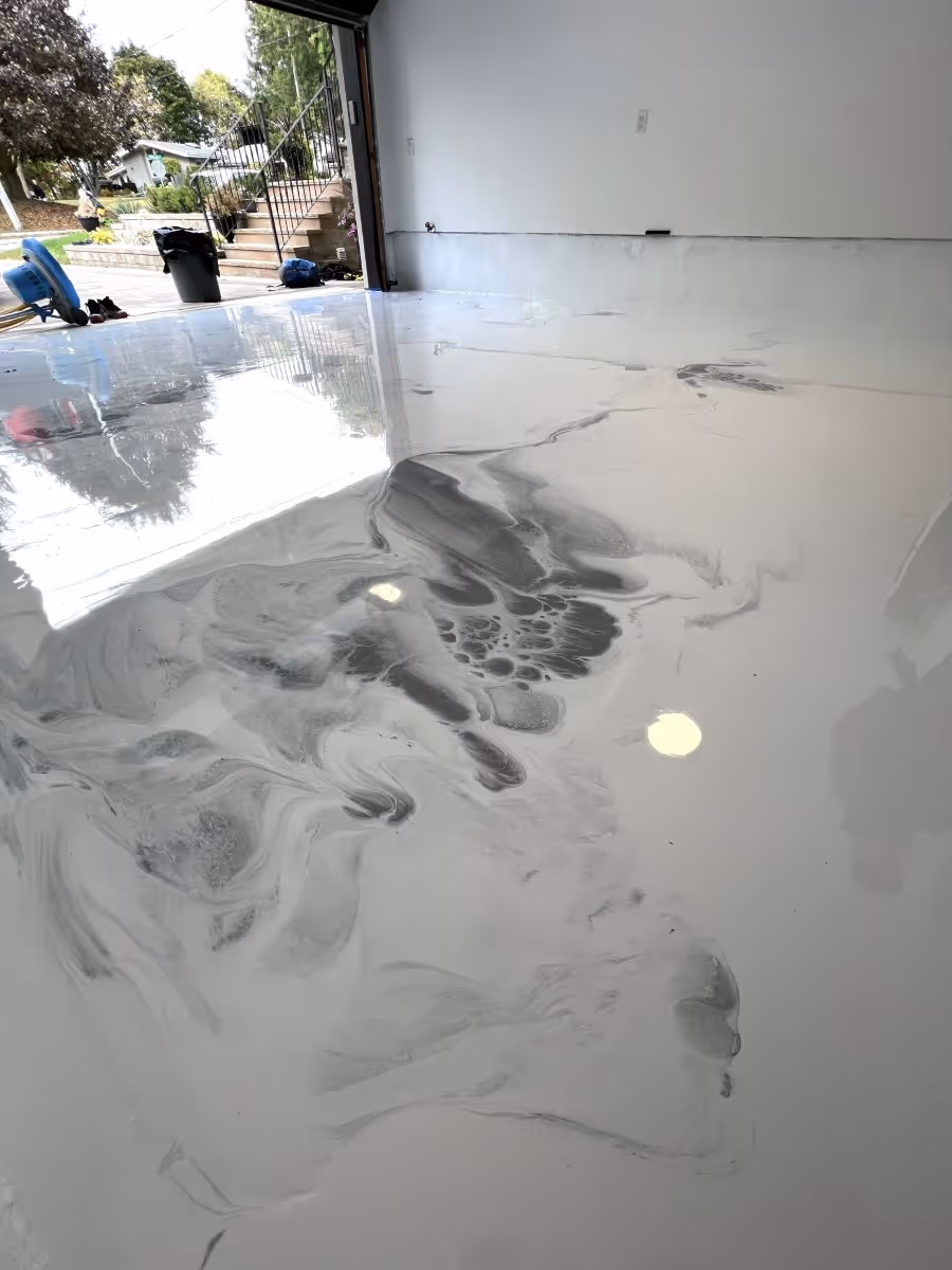 Metallic epoxy floor coating inside a Tampa Florida garage