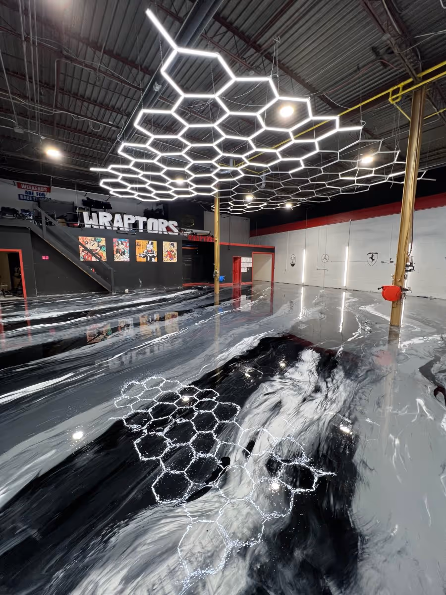 Commercial building with metallic epoxy flooring and polyaspartic top coat