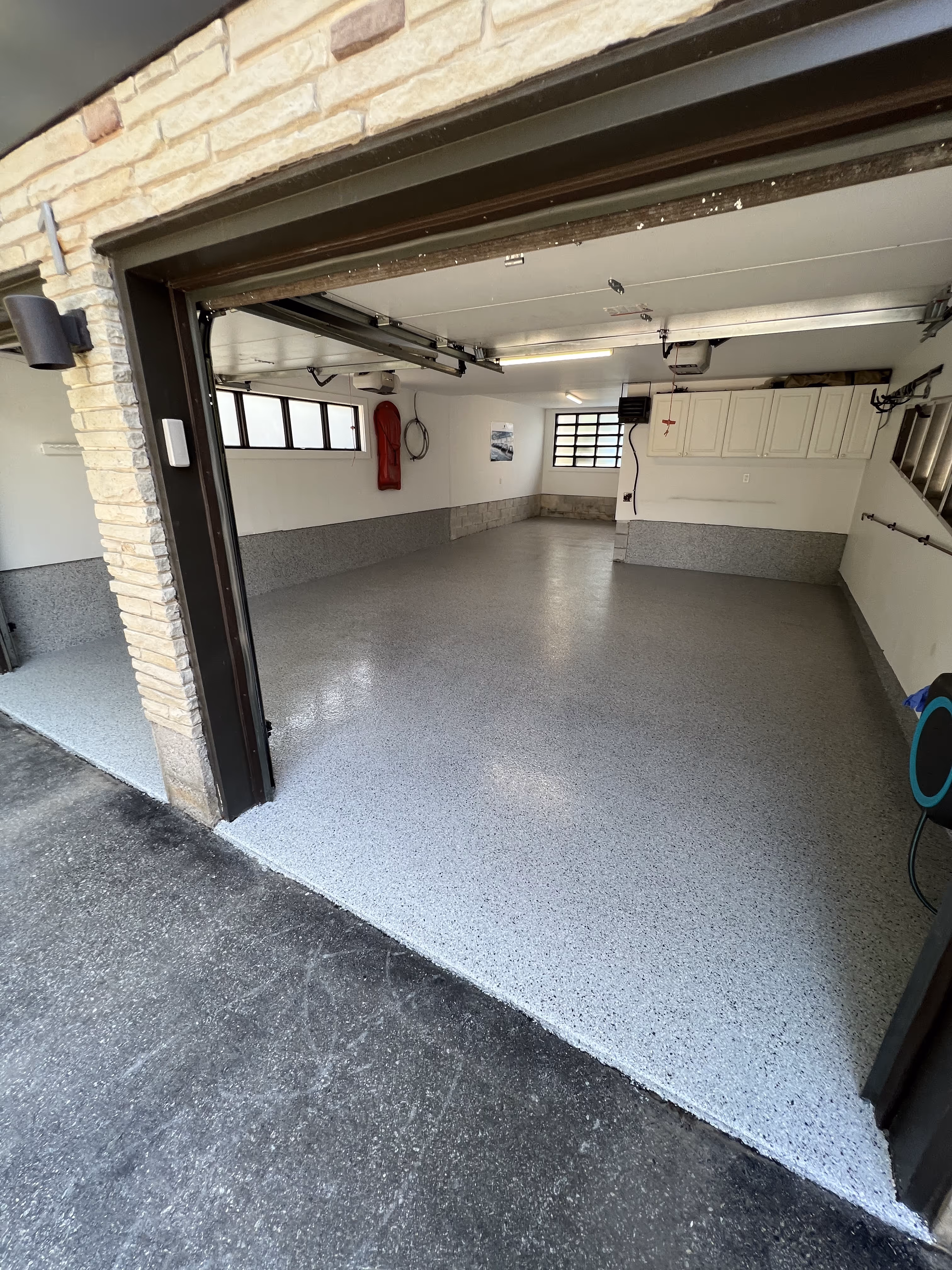 Double car garage with epoxy flake floor coating