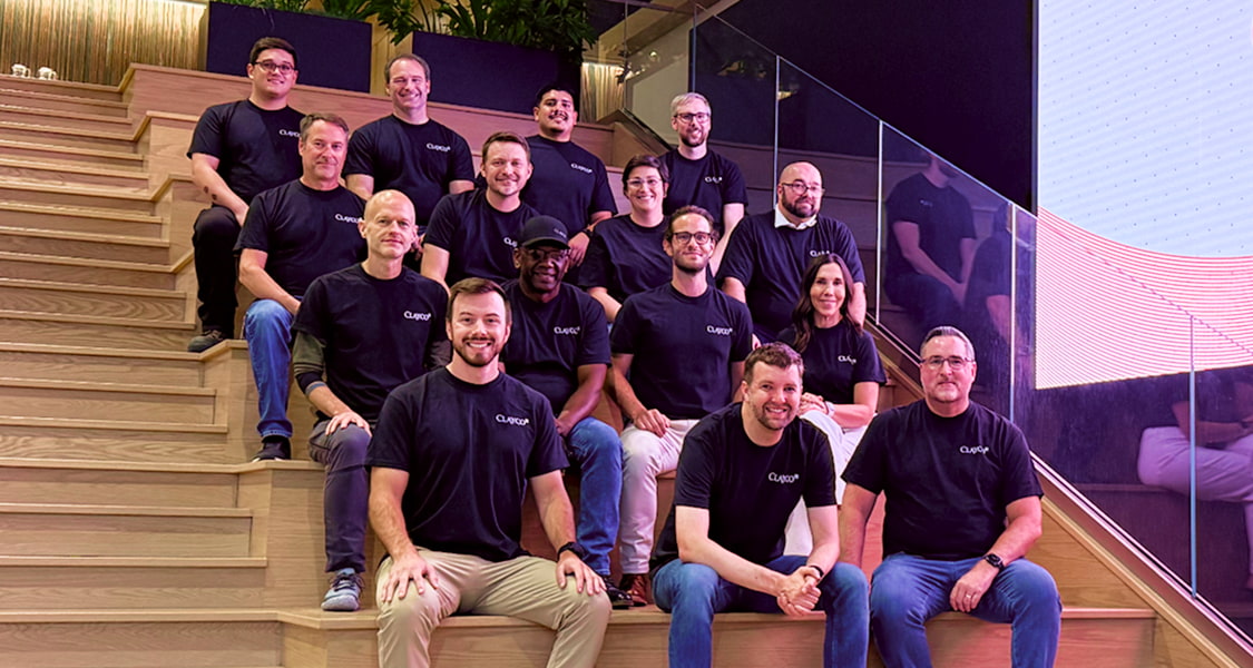 Collage of photos from an AI + Pizza event showing people collaborating on laptops, group discussions, and presentations. A large central graphic reads “AI + Pizza” with a note “No coding skills needed.” Winners of an in-person AI challenge are announced on stage, while attendees enjoy networking, teamwork, and casual conversations in a modern office setting.