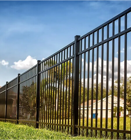 A garden with sturdy top notch aluminum fences.