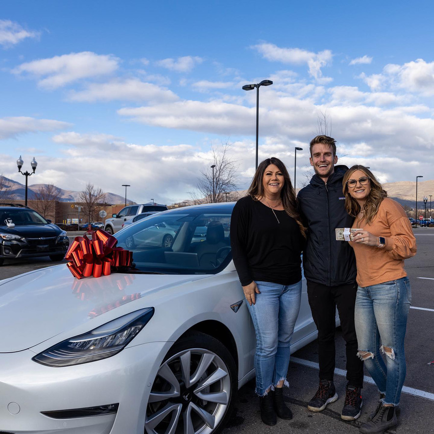 White Tesla given away during a Fund Launch campaign
