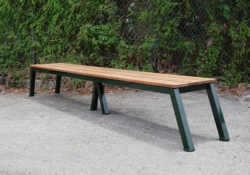 custom 9-foot ipe wood golf course bench at Quaker Ridge Golf Club, powder-coated aluminum frame