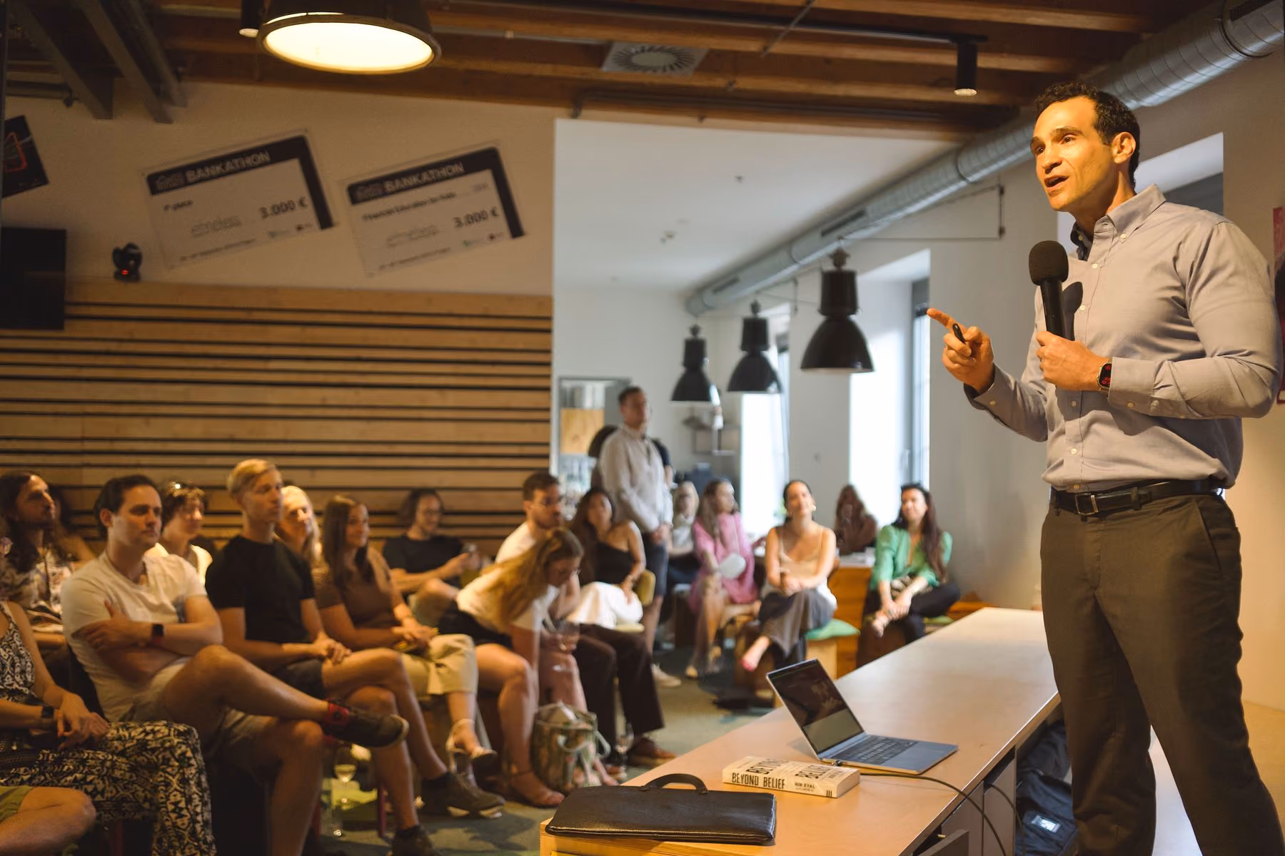 Nir Eyal speaking to a full room at his Beyond Belief keynote in Prague