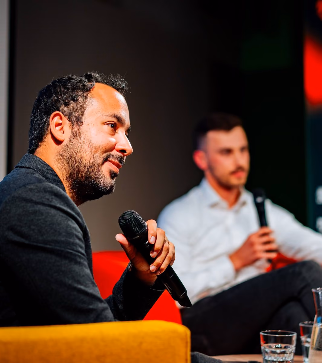 Ricardo Monagas in a fireside chat with Jan Brauner at Impact Night
