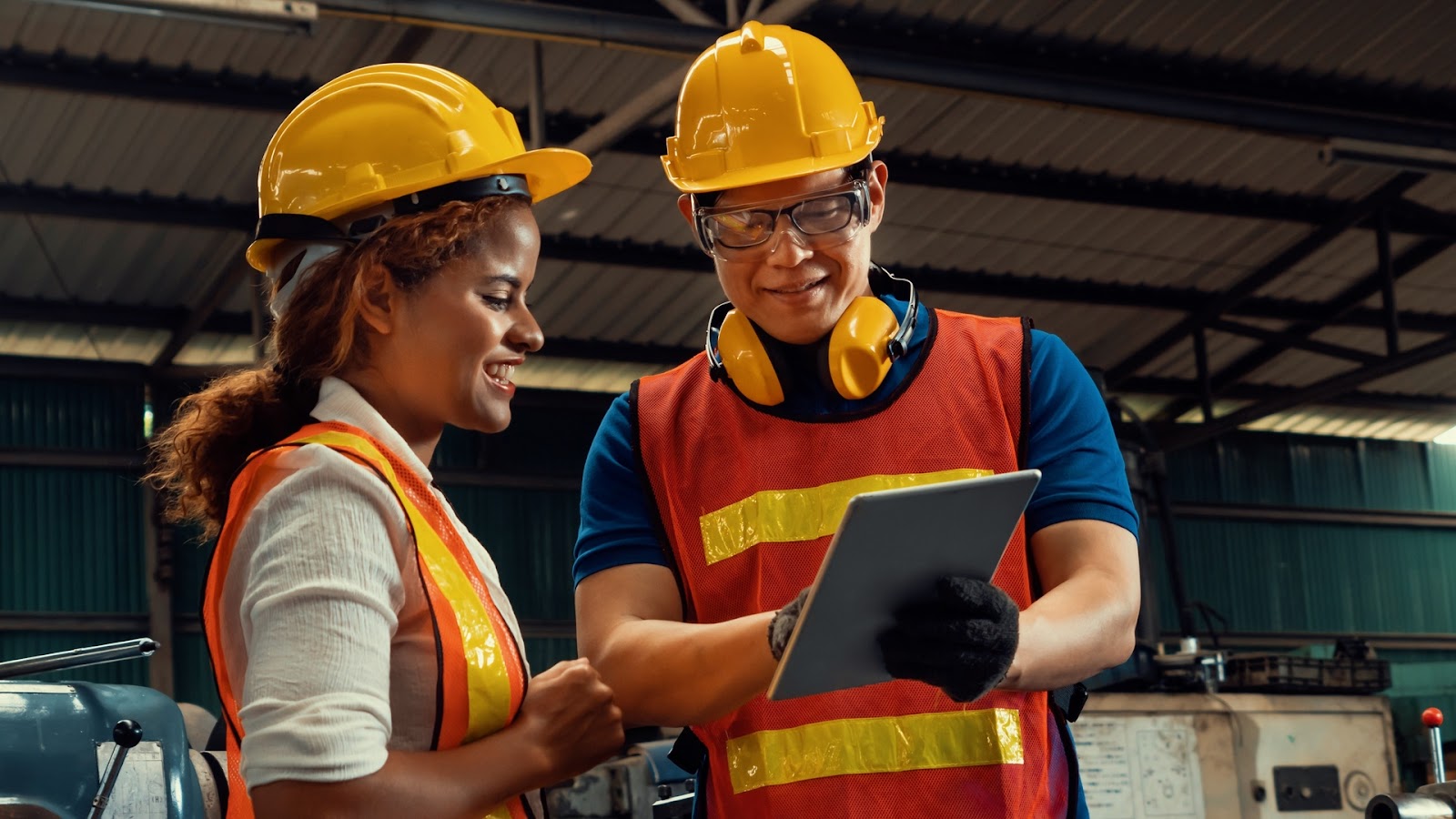 Two maintenance technicians looking at an SOP