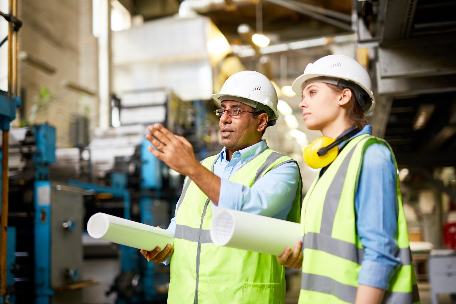 Manufacturing professionals assessing equipment.