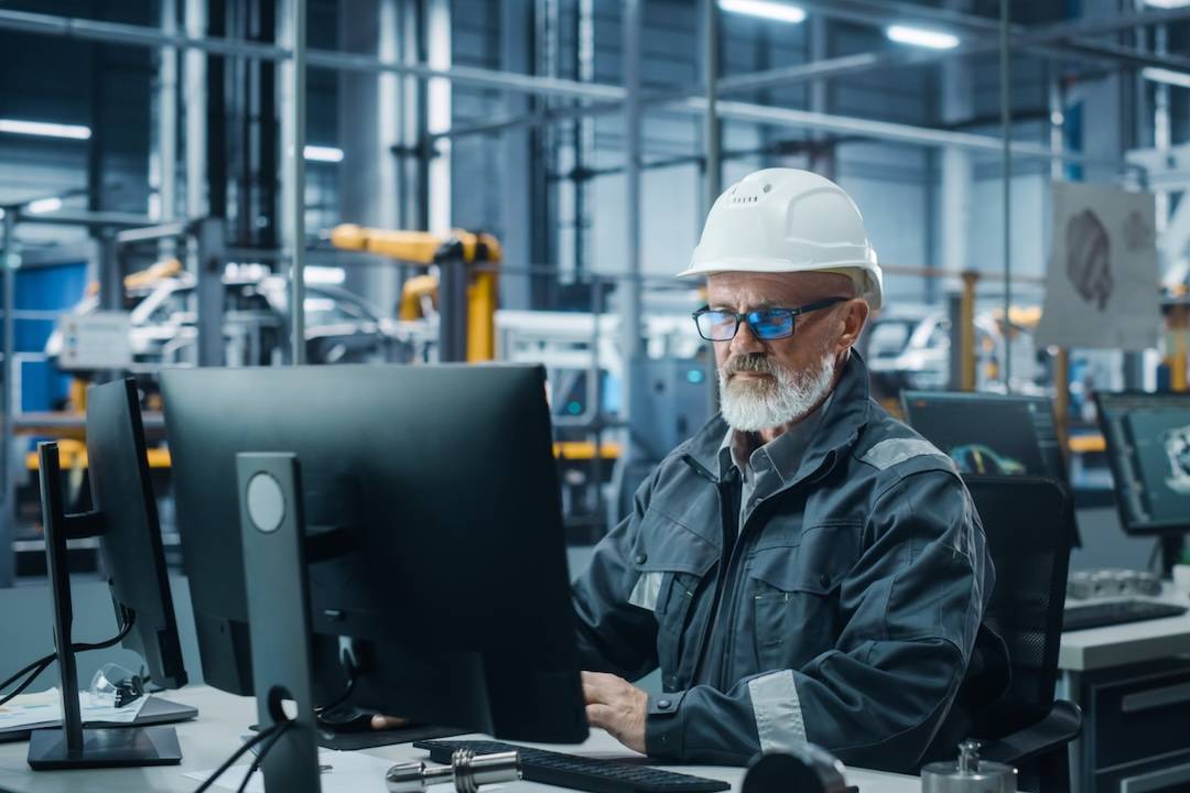 A manufacturing engineer using AI