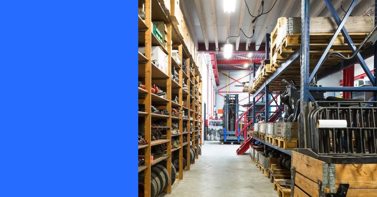 photo of a parts storage closet with tall shelves on both sides