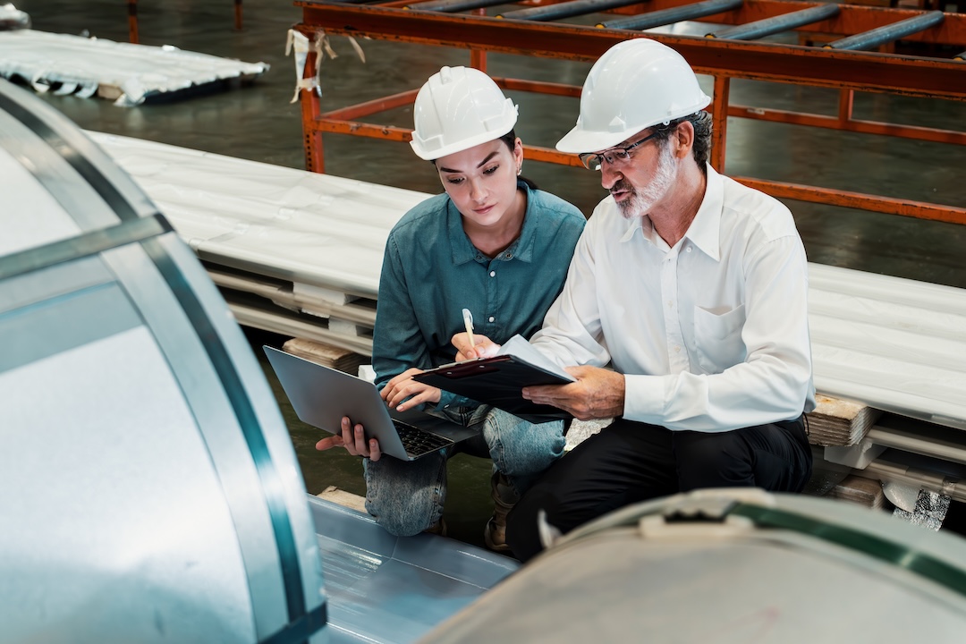 Metalwork manufacturing factory manager inspect newly manufactured metal or steel